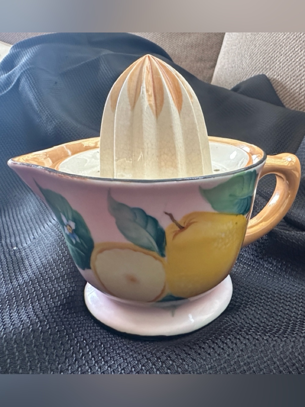 Hand-Painted Pink Ceramic Citrus Juicer with Leaf Motif